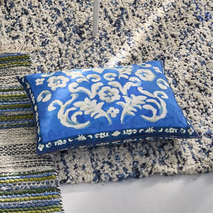 Isolotto Cobalt Cushion, by Designers Guild on area rug