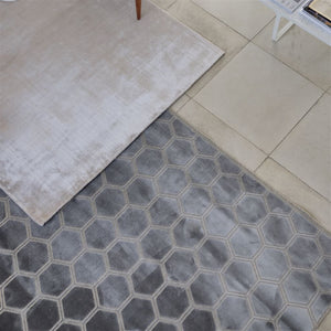 Designers Guild Manipur Silver Rug on Tile Floor