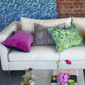 Designers Guild Cassia Aubergine & Magenta Cushion on Sofa