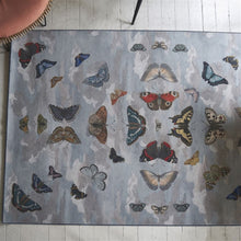 Load image into Gallery viewer, John Derian Mirrored Butterflies Sky Rug on Painted Wood Floor