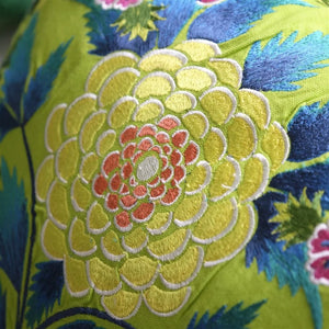 Brocart Décoratif Embroidered Lime Cushion up close, by Designers Guild