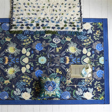 Load image into Gallery viewer, Designers Guild Rose de Damas Embroidered Indigo Cushion hiding on top of coordinating Brocart Decorative Rug from Designers Guild
