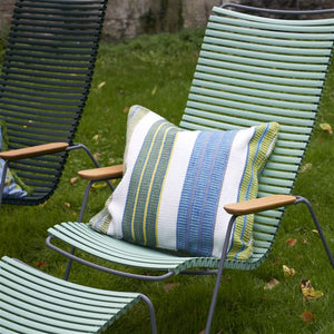 Designers Guild Mahakam Cobalt Outdoor Cushion on Green Outdoor Chair
