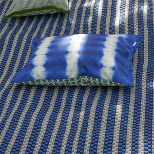 Designers Guild Jaal Emerald Outdoor Cushion on Outdoor Rug