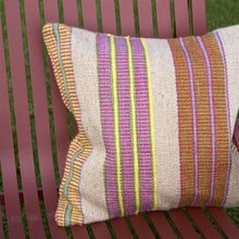 Load image into Gallery viewer, Designers Guild Mahakam Fuchsia Outdoor Cushion on Outdoor Chair
