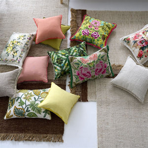 Foglia Decorativa Embroidered Moss Cushion, by Designers Guild with other cushions on area rug