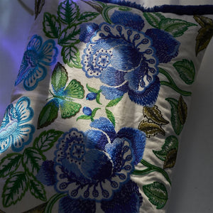 Isabella Embroidered Cobalt Cushion, by Designers Guild in shadow