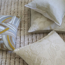 Indlæs billede til gallerivisning Decorative pillows on a textured surface