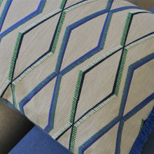 Indlæs billede til gallerivisning Geometric patterned cushion with natural background and cobalt trim