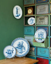 Indlæs billede til gallerivisning a collection of blue and white wall plates with animal motifs
