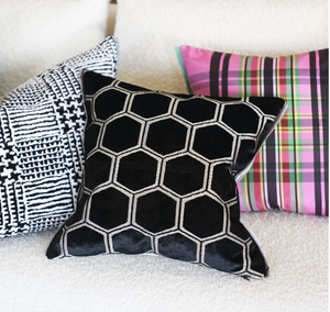 Manipur Noir Velvet Cushion, by Designers Guild on sofa